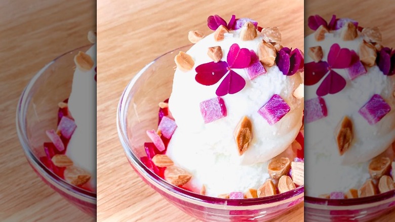 Yogurt sundae topped with blossoms