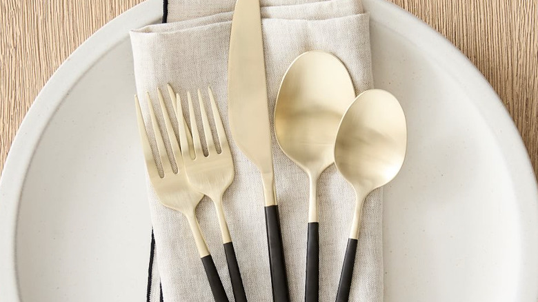 Gold and black silverware set