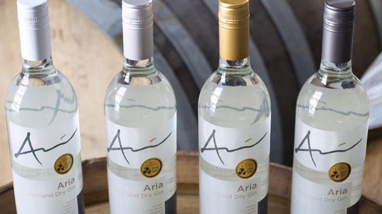 four Aria gin bottles