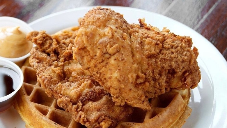 Chicken and waffles on plate