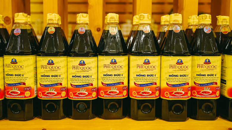 bottles of fish sauce in a line