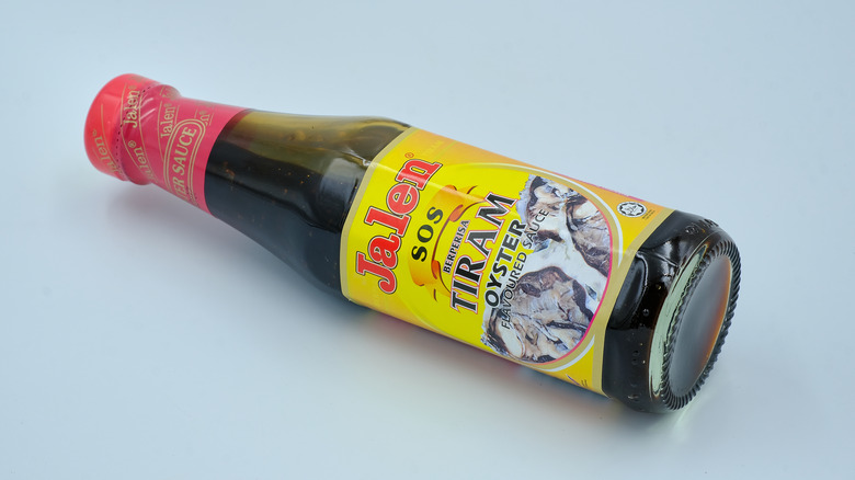 a bottle of oyster sauce on its side