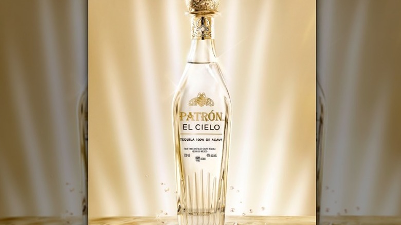 Patrón bottle gold background