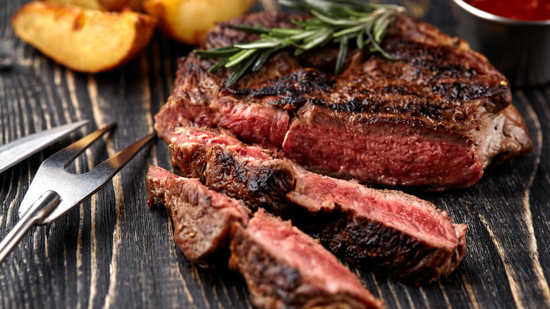 Juicy steak on table