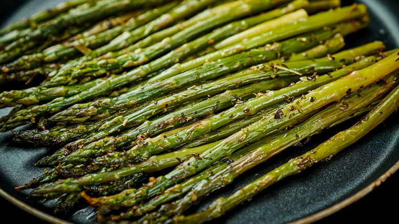 Roasted asparagus in pan