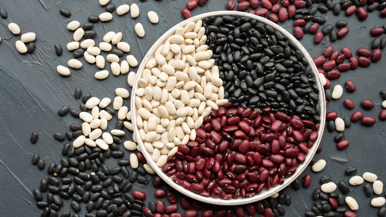 Bowl of white black red beans