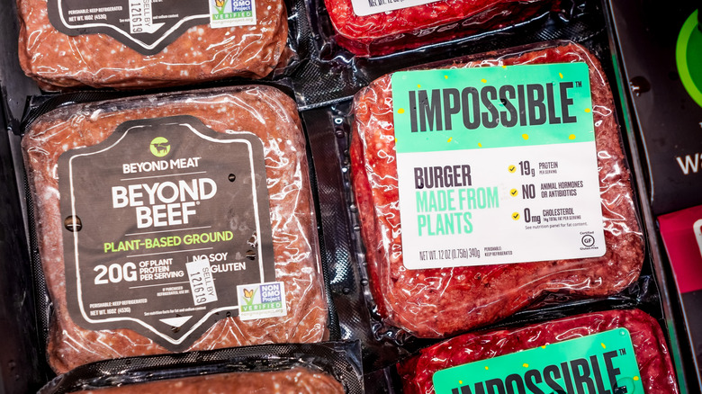 Packages of plant-based Beyond and Impossible meat