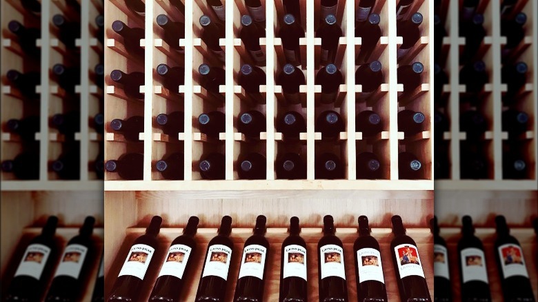 Bottles of wine stored on wall