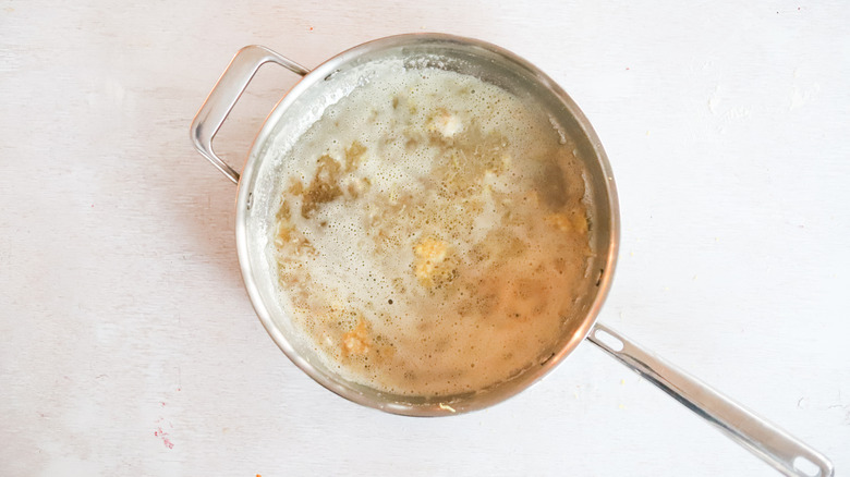 butter and garlic in saute pan