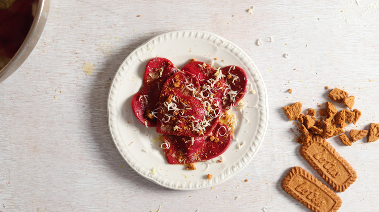 beet ravioli on white plate