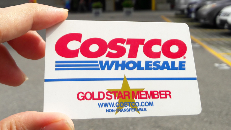 Costco card in person's hand