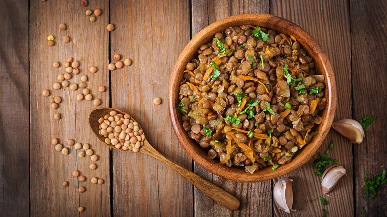 Cooked lentils and carrots in a bowl 