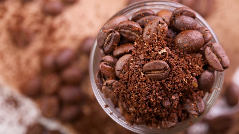 mixed whole coffee beans and grounds