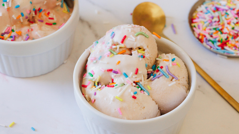 Two ice cream servings with sprinkles