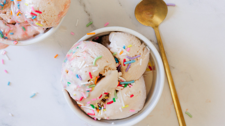 Overhead of ice cream servings with spoon