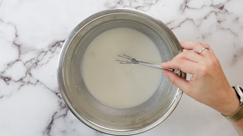 Whisking Ice cream mix in bowl