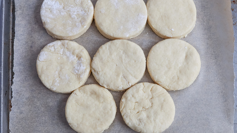 unbaked biscuits on baking sheet