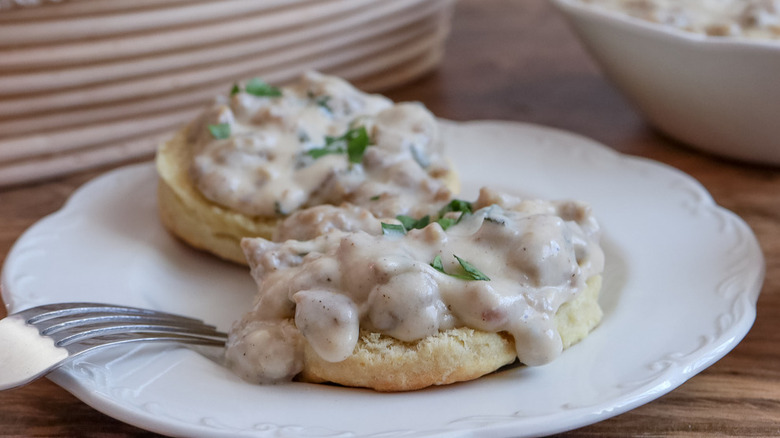 biscuits and herb gravy on plate