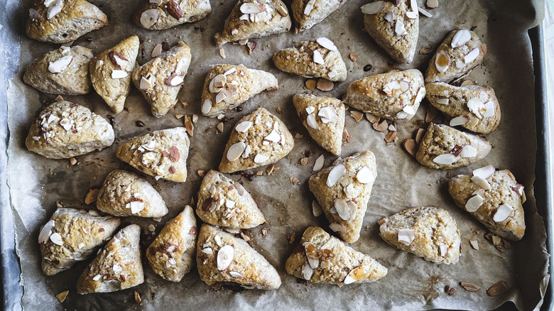 baked triangular scones with almonds