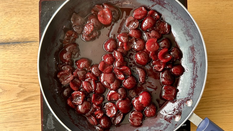 Cooked cherries in a pan