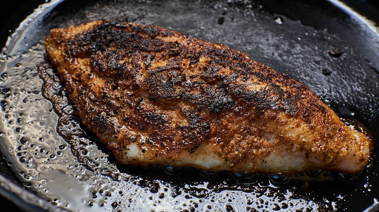 cooking catfish in skillet