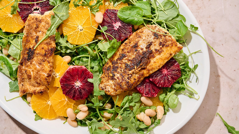 blackened cod on salad