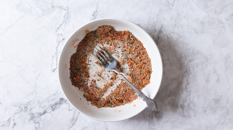 spice mix in white bowl with fork