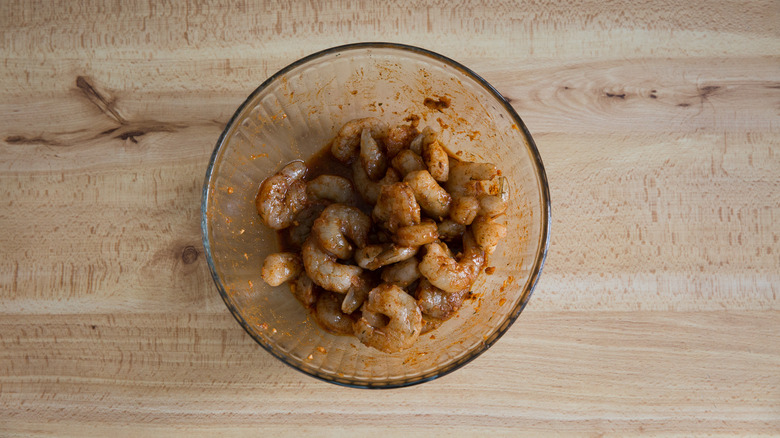 shrimp in bowl of marinade