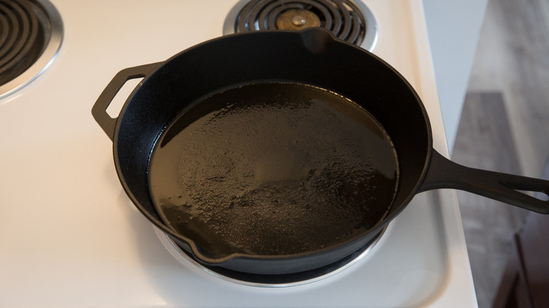 oil heating in iron pan 