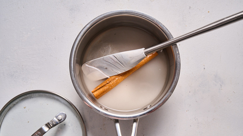 stirring sugar in pot