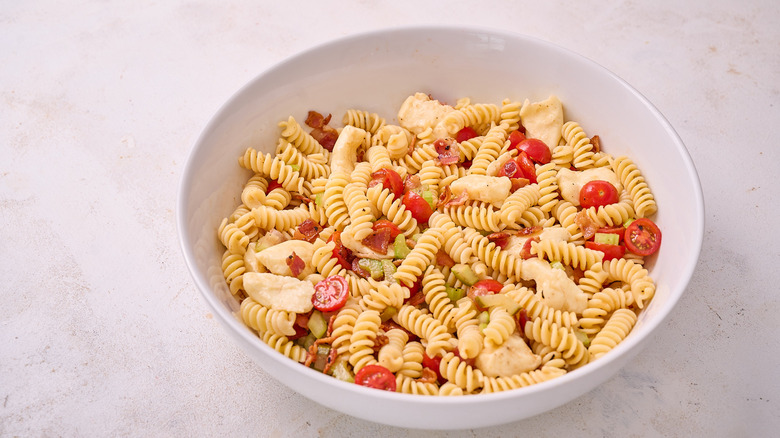 bloody mary pasta salad in bowl