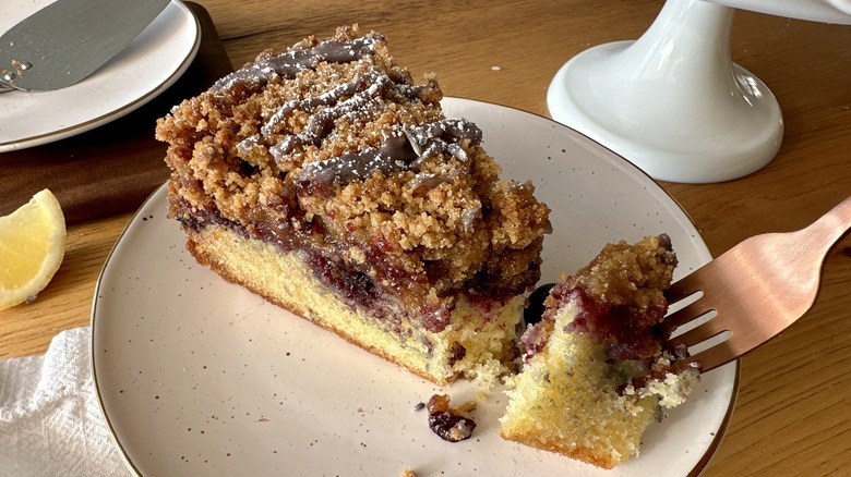 Fork with bite of coffee cake