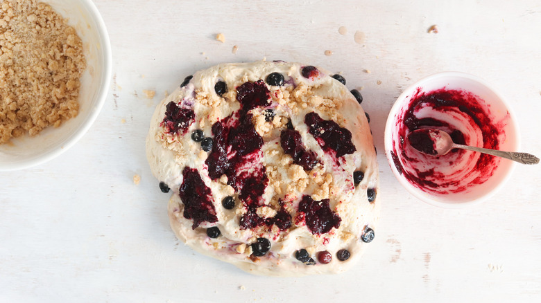 blueberry jam spread over raw sourdough