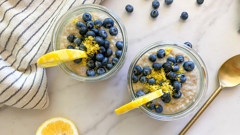 2 glass jars with tapioca and blueberries