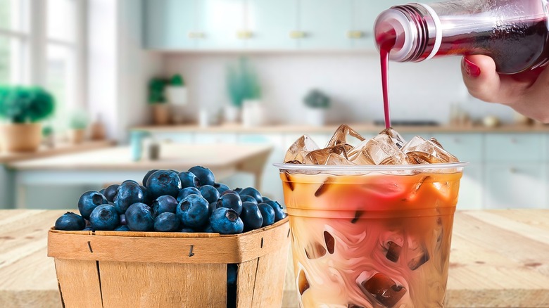 blueberries and syrup with iced coffee