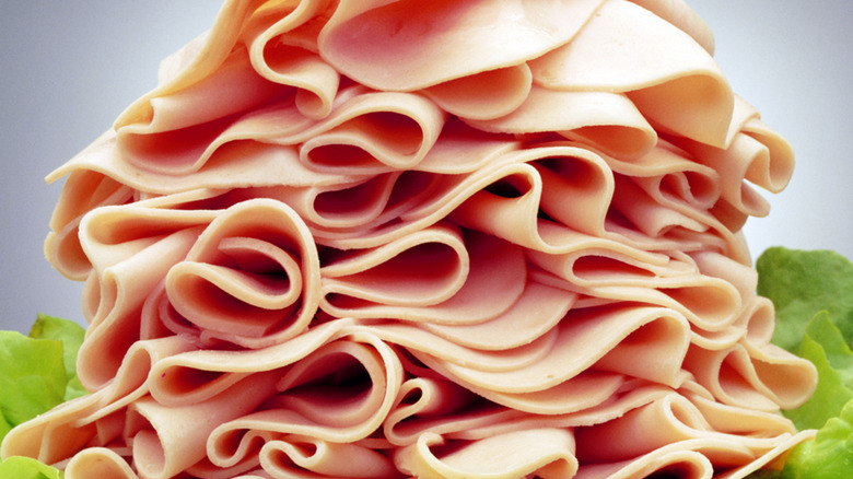 stacked sliced deli meat