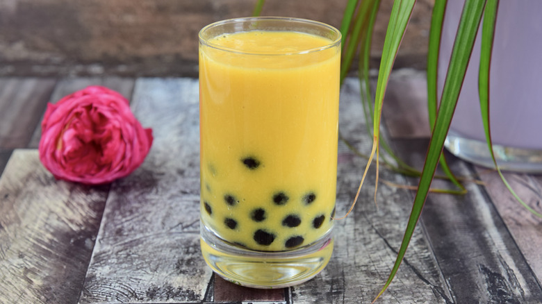 Glass of mango bubble tea