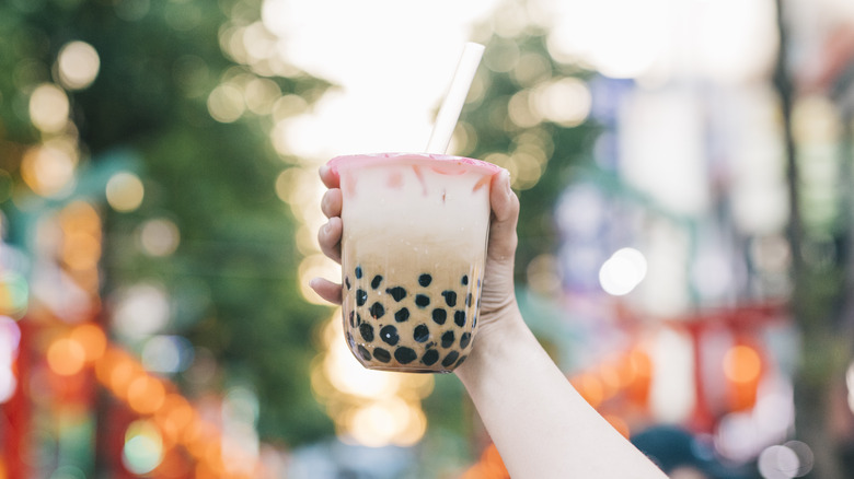 Hand holding bubble tea