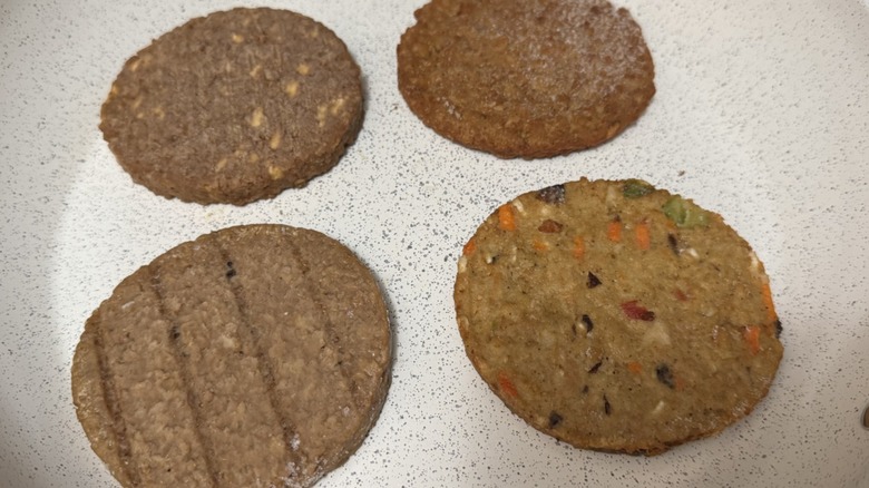 Burger patties in a pan