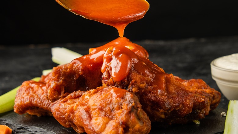 Buffalo sauce on bone-in wings