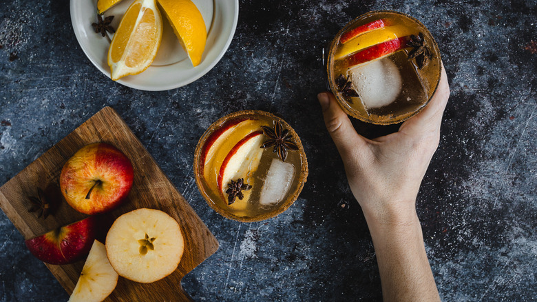 apple cider drinks with garnishes