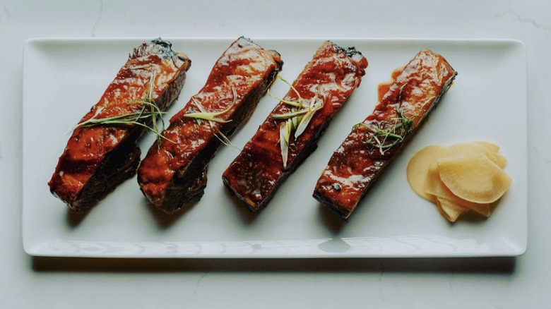 rib appetizer on white plate