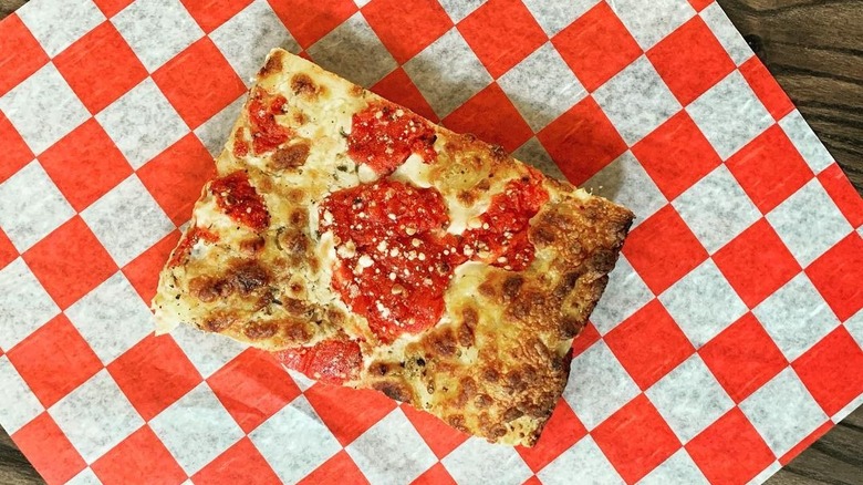 Detroit style pizza slice