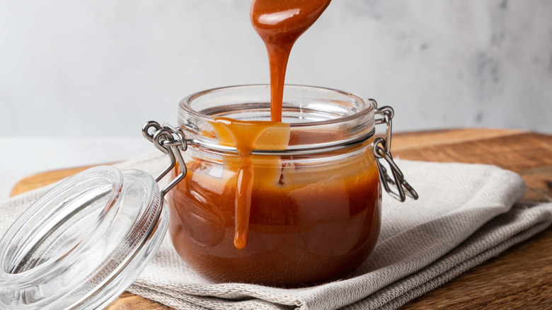 A jar of caramel sauce