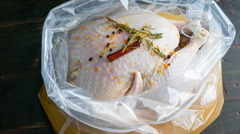 Raw turkey in bourbon brine