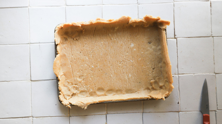 Pie dough pressed in edges