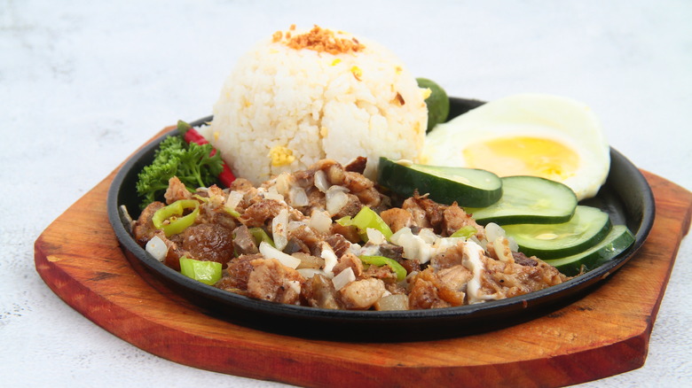 pork sisig with a side of rice 