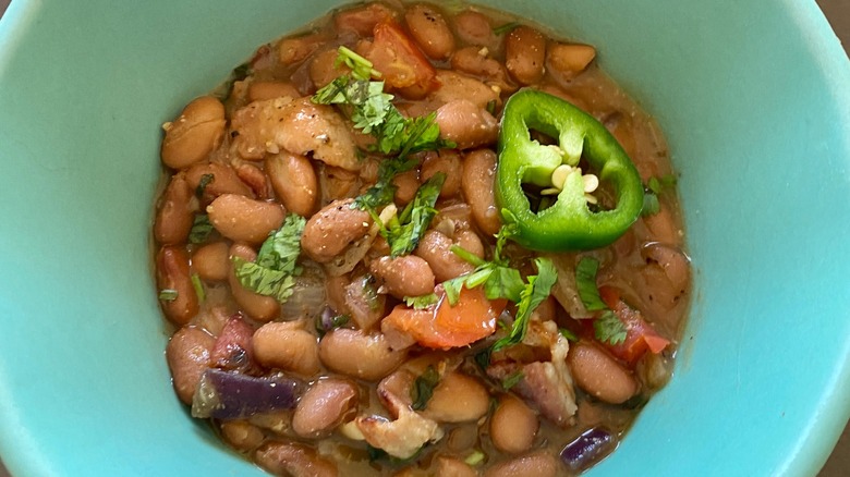 charro beans in a teal bowl