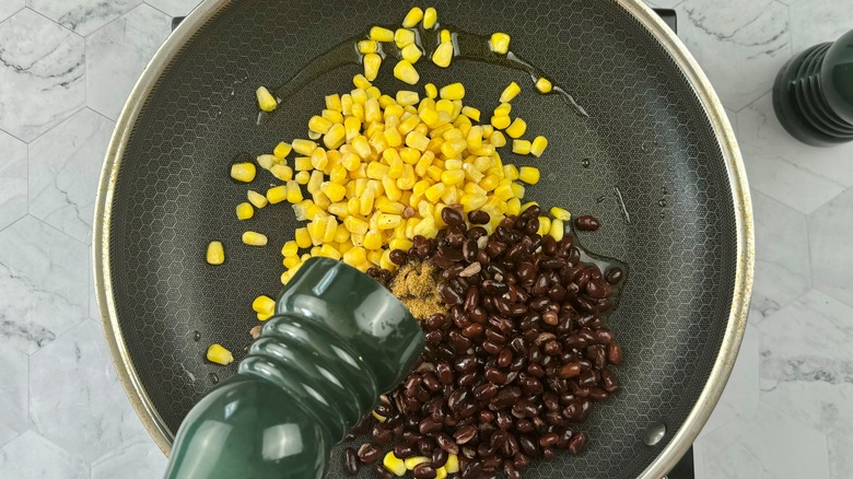 corn and beans in pan