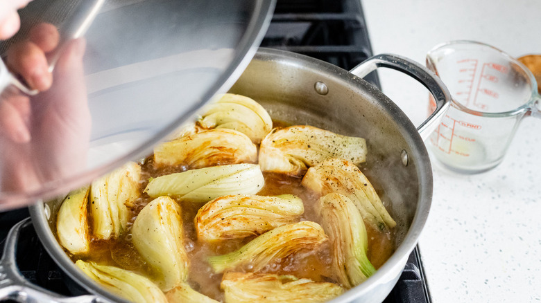 fennel and stock in pan